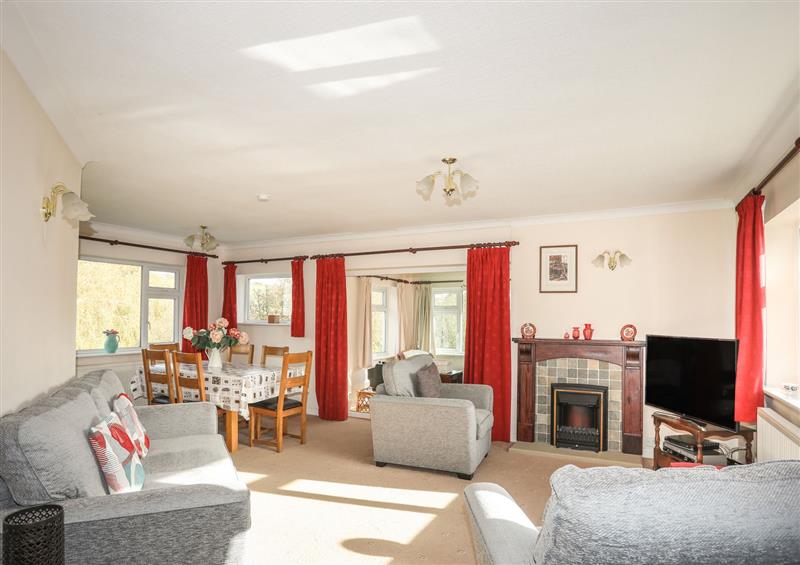 Relax in the living area at 14 Cae Pin, Abersoch