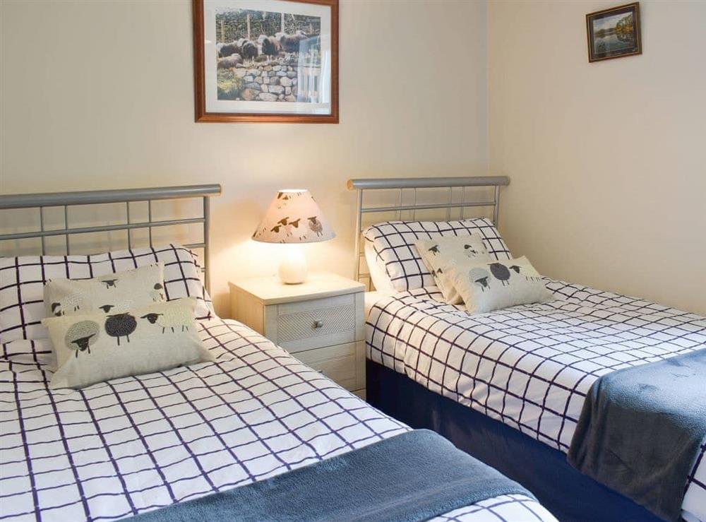 Twin bedroom at 14 Elm Court, Elliott Park in Keswick, Cumbria