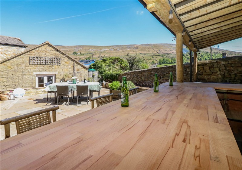 Enjoy a cup of tea on the patio at 14 Hill Close, Reeth