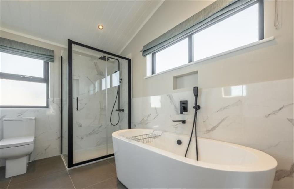 Ground floor: En-suite has stand-alone bath and separate shower cubicle at 14 Westgate, Burnham Market near Kings Lynn