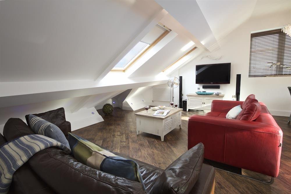 Attractive open-plan living area with leather sofas (photo 2) at 15 At The Beach in , Torcross