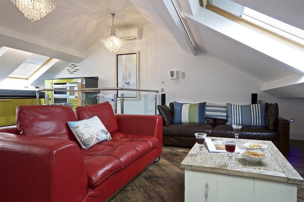 Attractive open-plan living area with leather sofas at 15 At The Beach in , Torcross