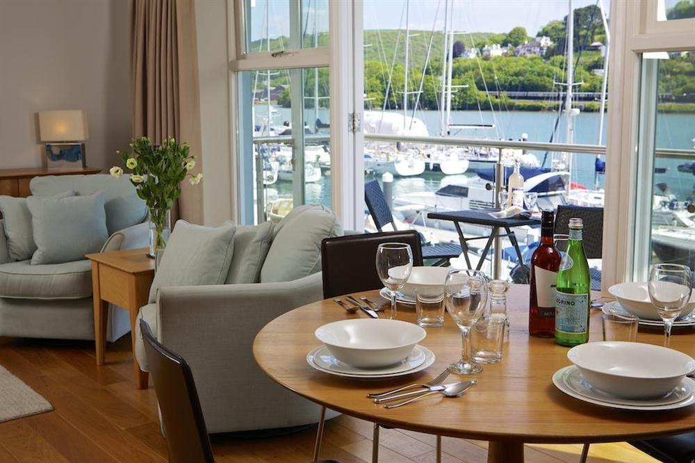 Glass doors lead out to balcony offering lovely views up and down the river at 15 Dart Marina in Sandquay Road, Dartmouth