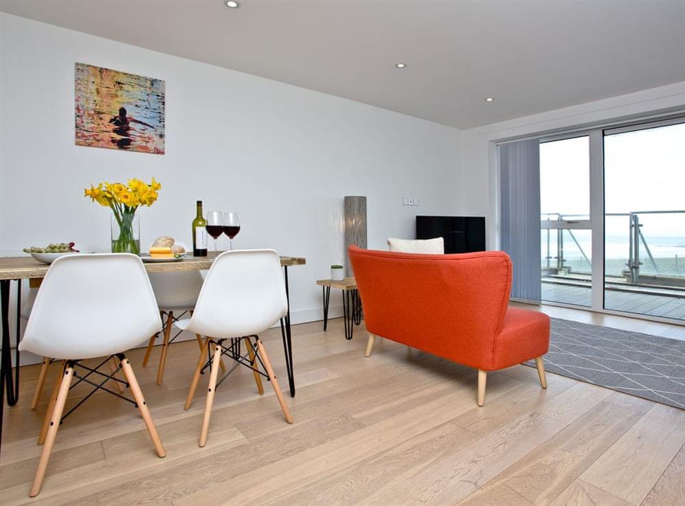 Dining area at 15 Ocean Gate in Newquay, Cornwall
