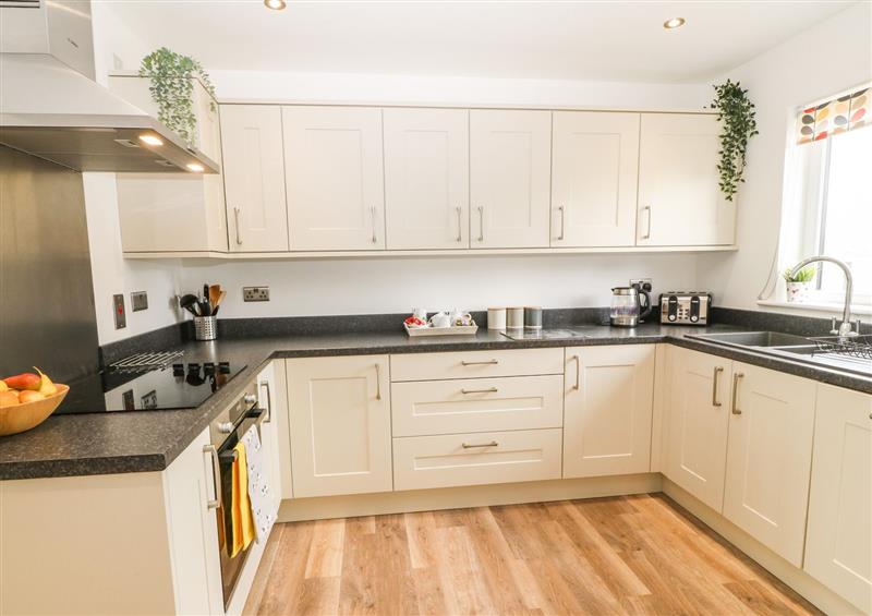 This is the kitchen (photo 2) at 15 Parc Delfryn, Benllech