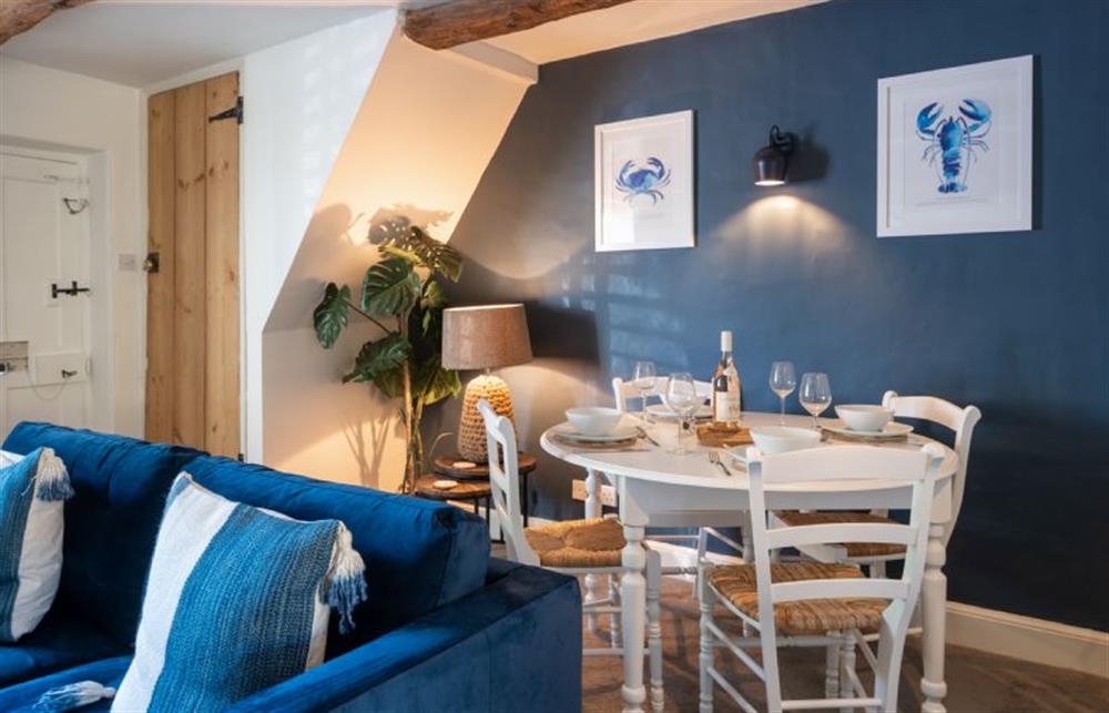 Dining area with seating for four guests at 154 Blakeney High Street, Blakeney near Holt