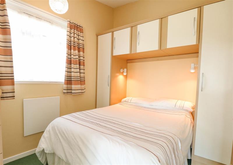 A bedroom in 154 at 154, Winterton-On-Sea