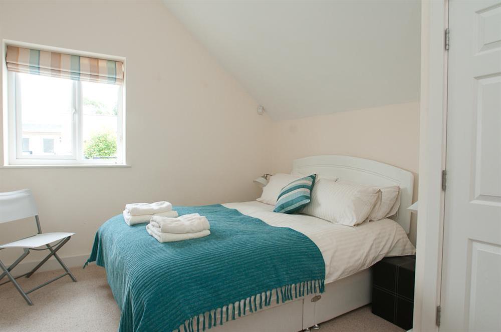 Master bedroom with King-size bed at 16 Bolt Head in South Sands, Salcombe