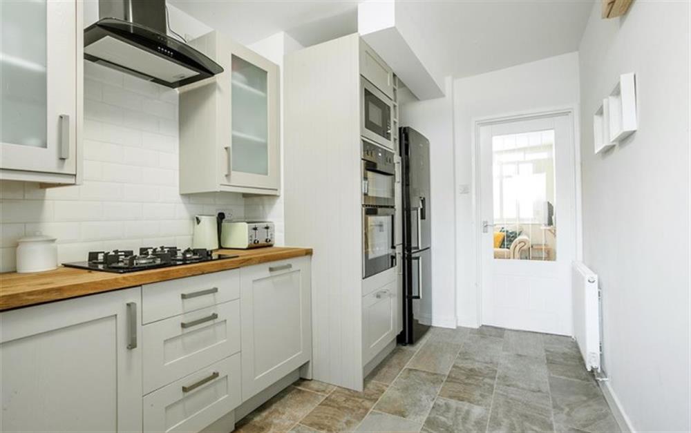 Fully equipped modern kitchen at 16 Church Street in Lyme Regis