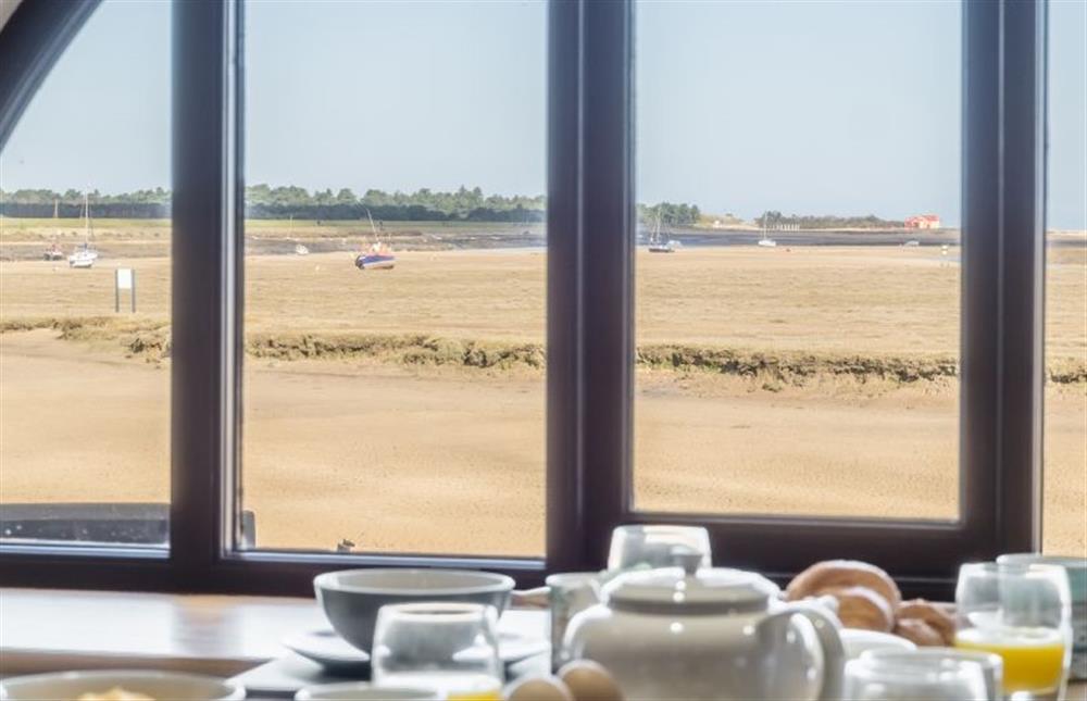 Ground floor:  Dining/kitchen with feature window and views to the sea at 16 The Granary, Wells-next-the-Sea