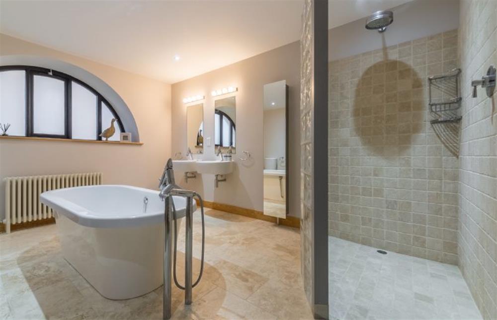 Ground floor:  En-suite bathroom with large walk in shower  at 16 The Granary, Wells-next-the-Sea
