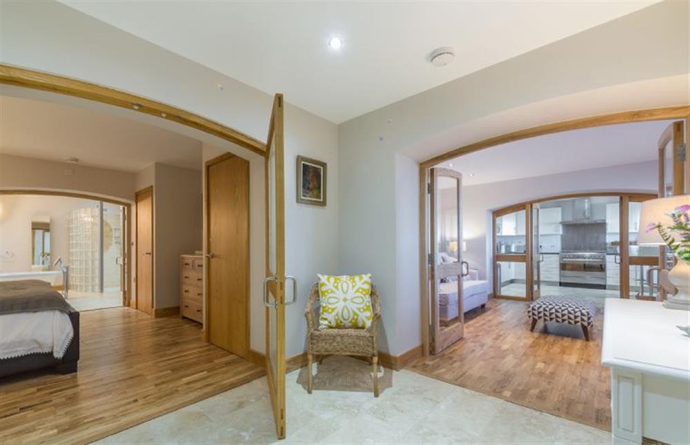 Ground floor:  Entrance hall with double doors to bedroom at 16 The Granary, Wells-next-the-Sea