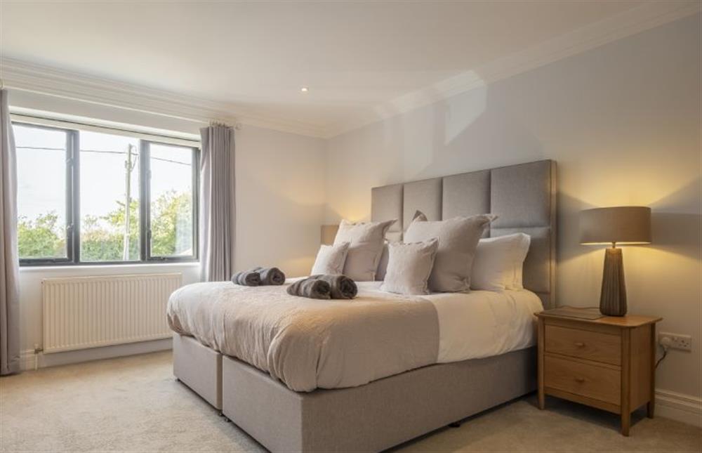 Master bedroom with super-king size bed at 17 Peddars Way, Holme-next-the-Sea near Hunstanton