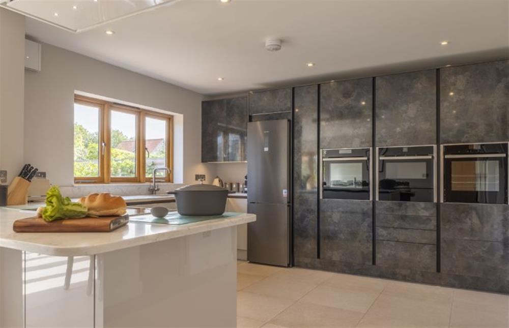 The modern integrated kitchen has two electric ovens and a microwave at 17 Peddars Way, Holme-next-the-Sea near Hunstanton