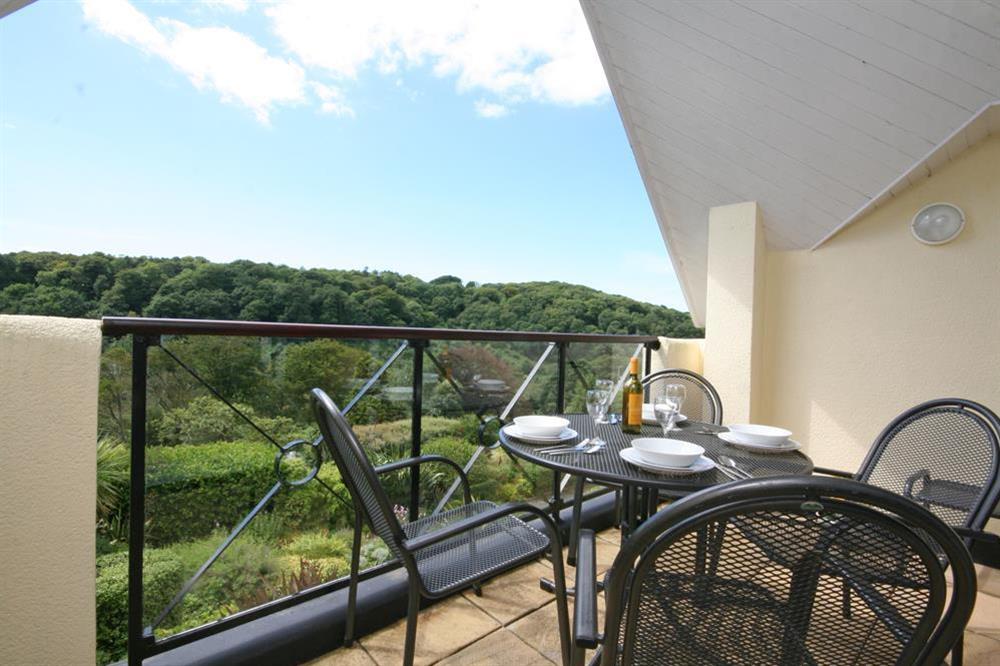 Balcony with table & chairs over looking North Sands valley at 17 St Elmo Court in Sandhills Road, Salcombe