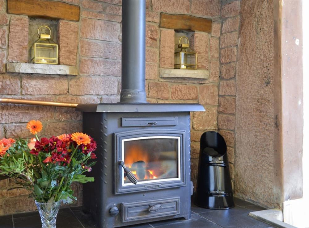 Cosy living area with multi-fuel burner (photo 2) at 1710 in Greenwell, near Brampton, Cumbria