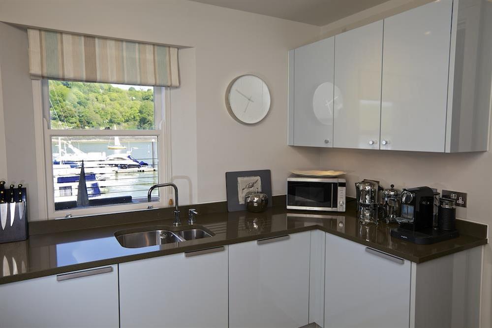 Watch the boats go by from the kitchen sink at 18 Dart Marina in , Dart Marina