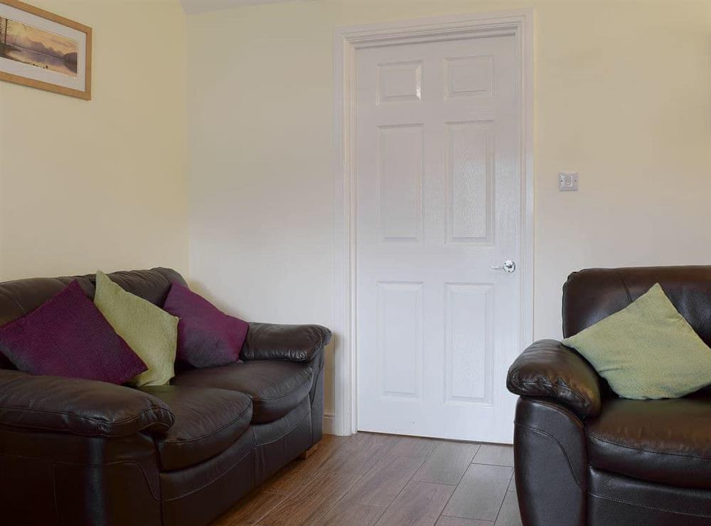 Cosy living room (photo 2) at 18 Elm Court in Keswick, Cumbria