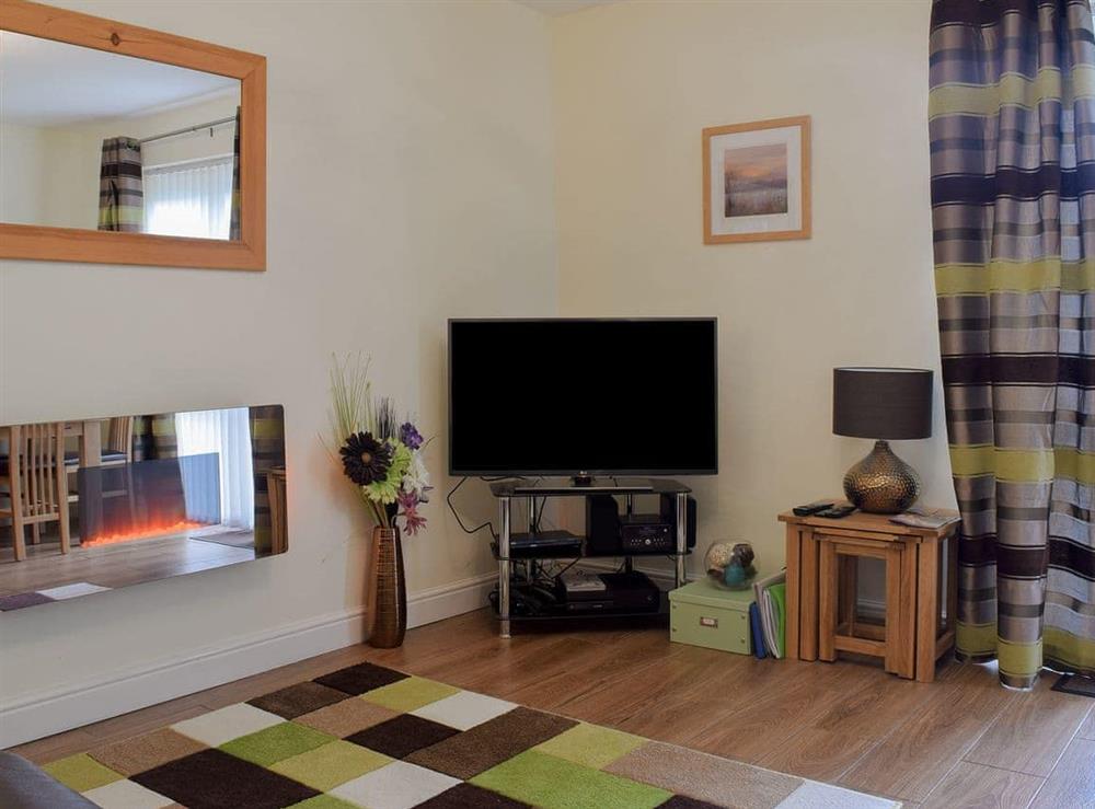 Cosy living room at 18 Elm Court in Keswick, Cumbria