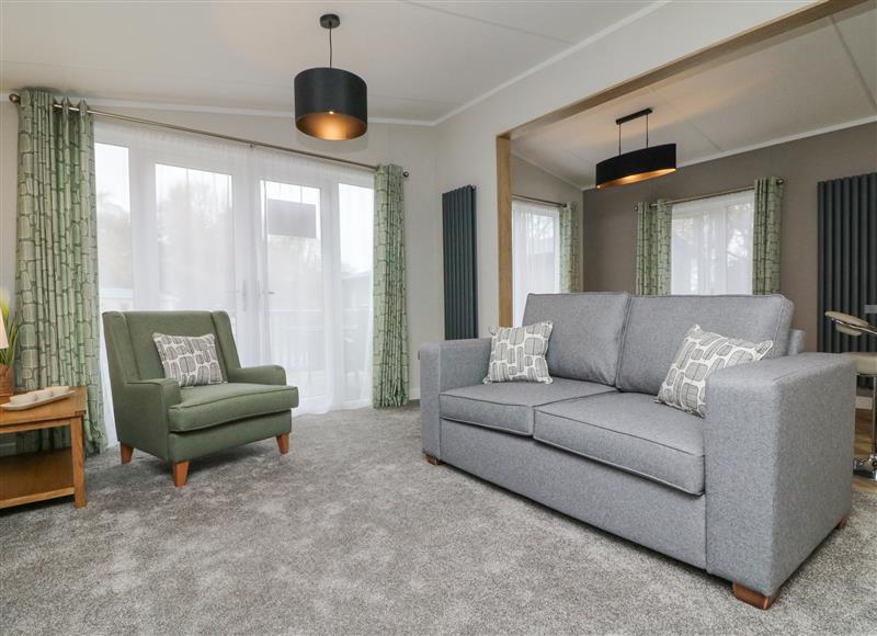 Relax in the living area at 18 Manleigh Park, Combe Martin