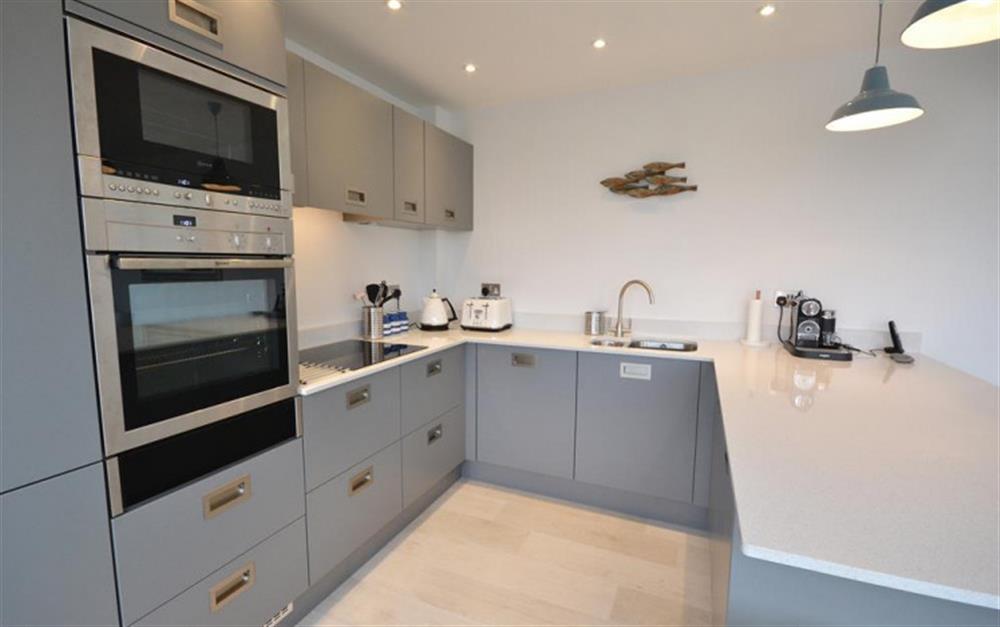 The modern easy kitchen at 18 Talland in Talland Bay