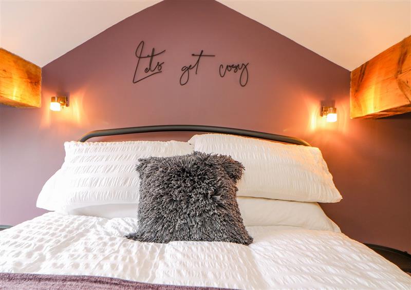 One of the bedrooms at 19 The Village, Holme near Holmbridge