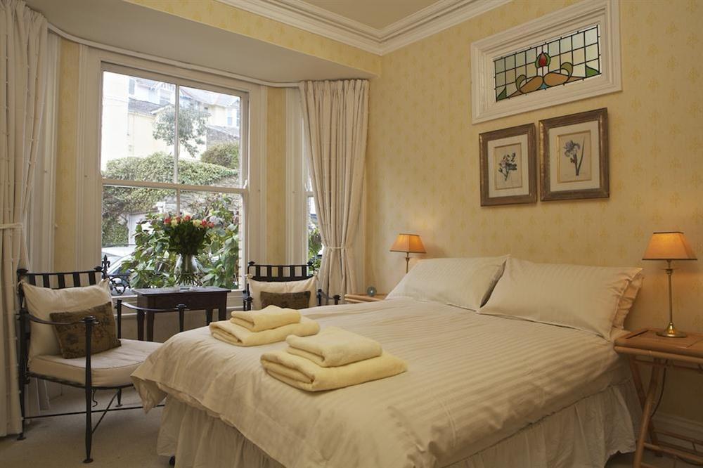 Large bedroom with king-size bed at 1c Harbour View in Devon Road, Salcombe