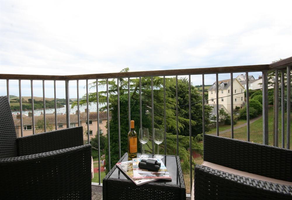 Small balcony with table and chairs to take in the wonderful views of the estuary at 1c Harbour View in Devon Road, Salcombe