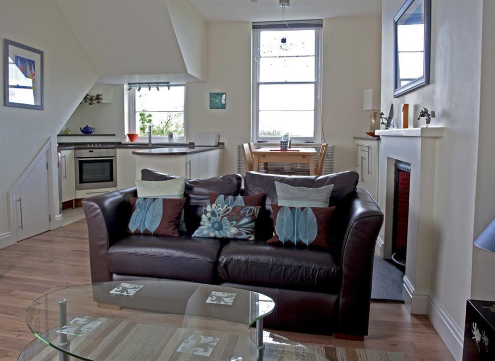 A bright, comfortably furnished open-plan room with lovely views at 2 Albany House in Allenhayes Road, Salcombe