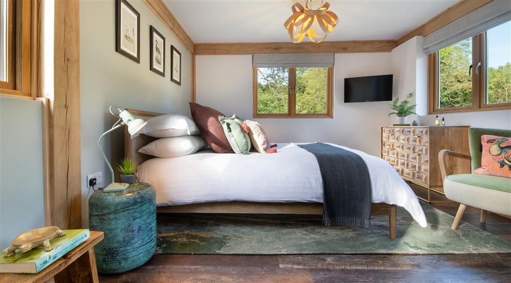 The king-size bedroom at 2 Bagden Farm Cottage in Dorking, Surrey
