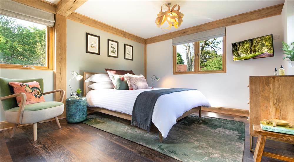 The king sized bedroom at 2 Bagden Farm Cottage in Dorking, Surrey
