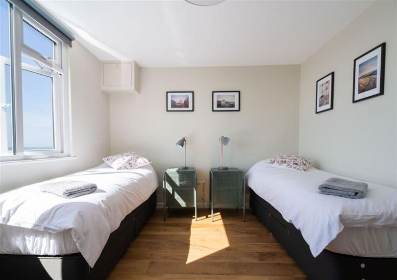 A bedroom in 2 Beach Way House at 2 Beach Way House, Lyme Regis