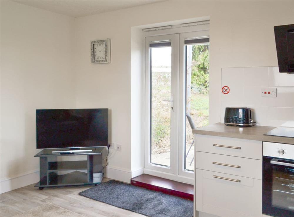 Open plan living space at 2 Bell Water Holiday Cottages in Midville, near Boston, Lincolnshire