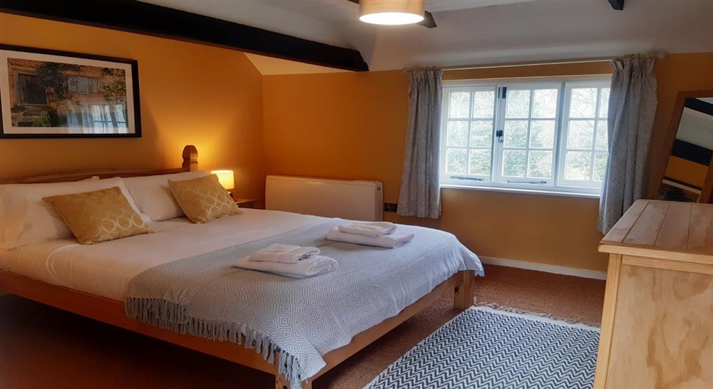The master bedroom at 2 Bettenham Cottages in Biddenden, Kent