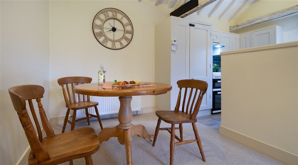The open plan kitchen, dining and sitting room (photo 3) at 2 Cart Lodge Barn in Upper Sheringham, Norfolk
