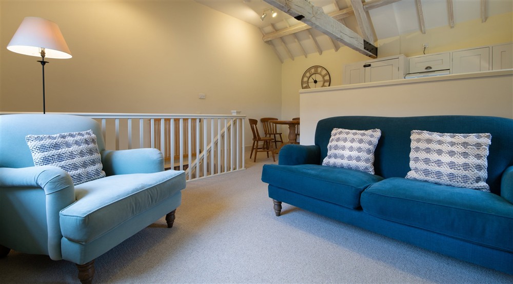 The open plan kitchen, dining and sitting room (photo 4) at 2 Cart Lodge Barn in Upper Sheringham, Norfolk