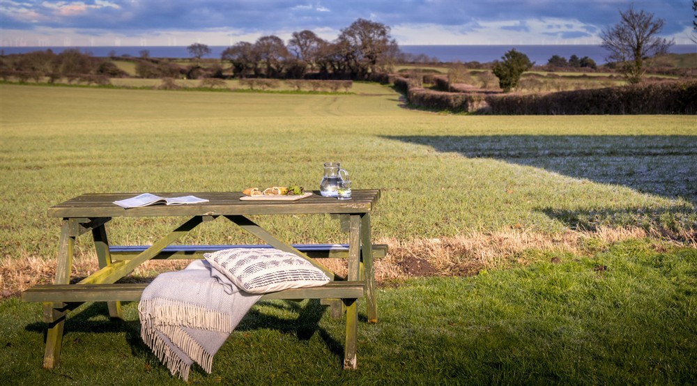 The outdoor seating at 2 Cart Lodge Barn in Upper Sheringham, Norfolk