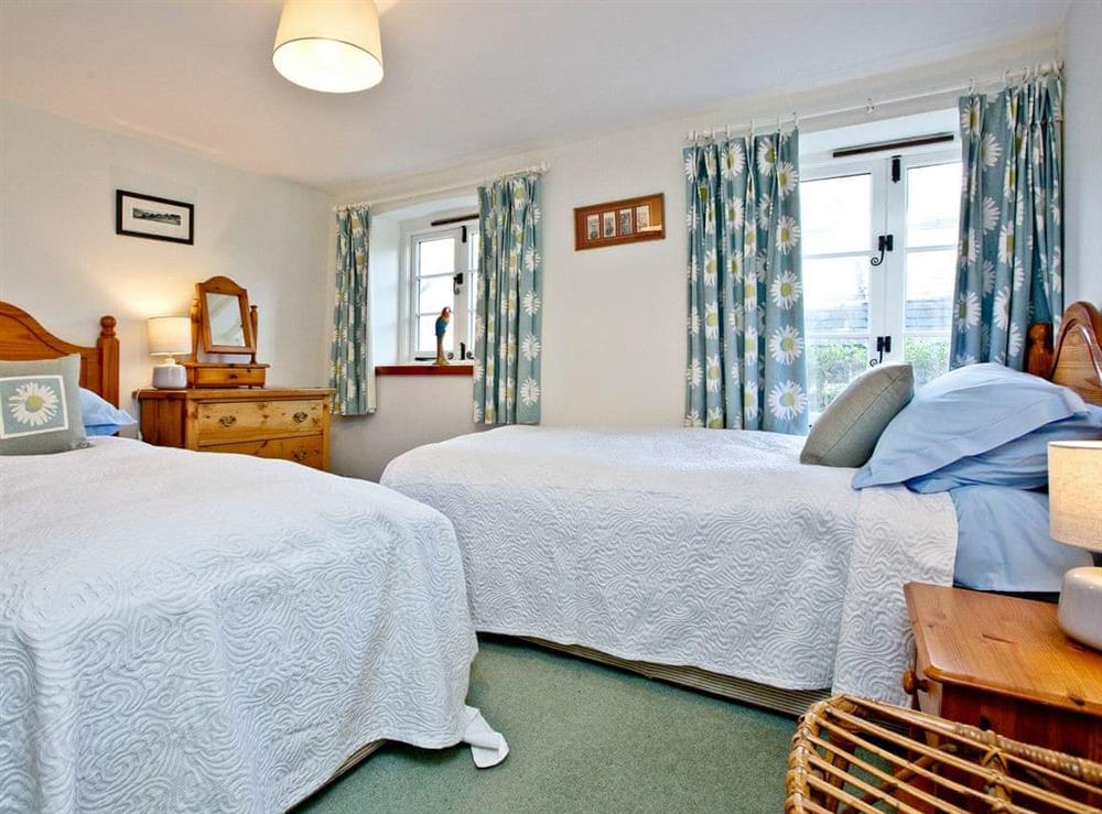 Charming twin bedroom with walk-in wardrobe at 2 Castle Cottage in Bow Creek, Nr Totnes, South Devon., Great Britain