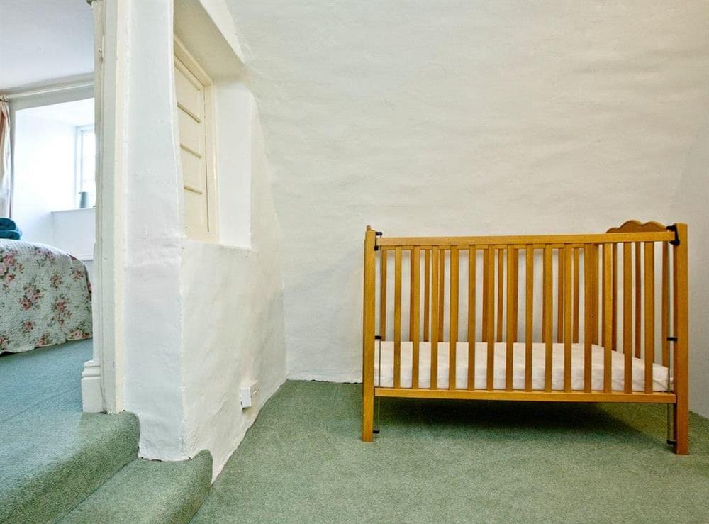 Relaxing double bedroom with separate dressing/cot area at 2 Castle Cottage in Bow Creek, Nr Totnes, South Devon., Great Britain