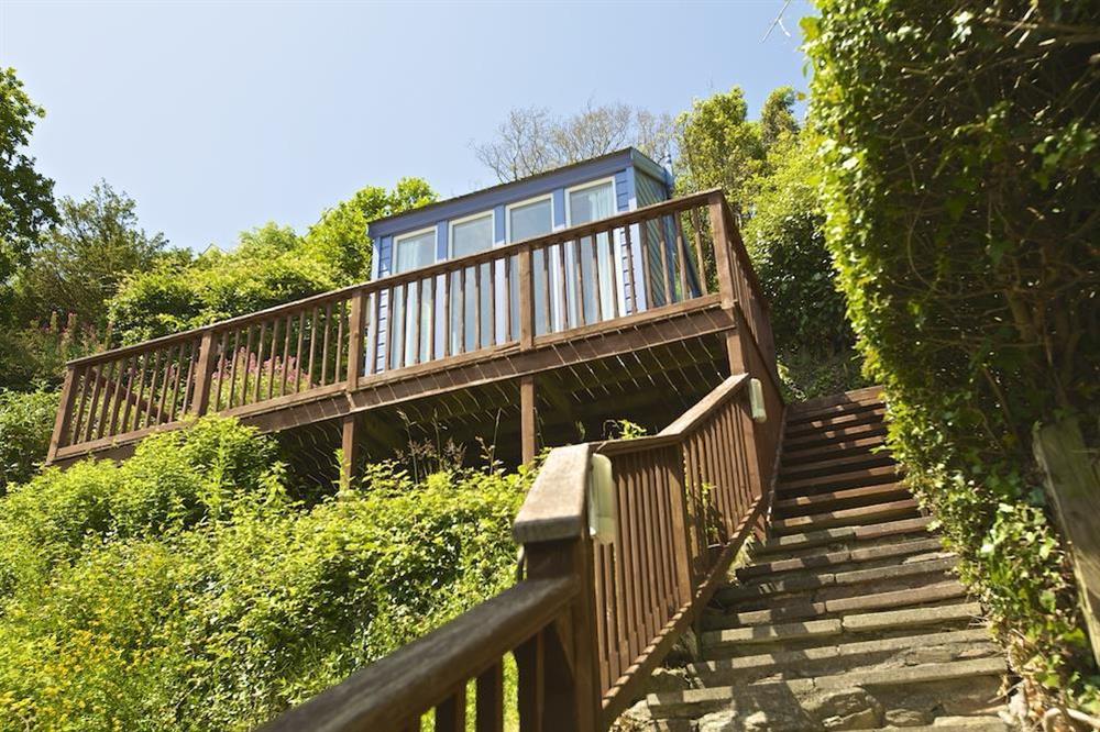 Steps lead up to the summer house at 2 Channel View in Bennett Road, Salcombe