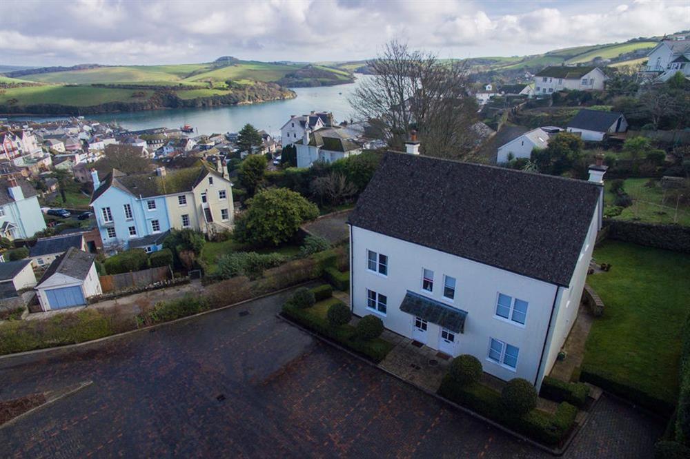 Aerial image showing 2 Combehaven to the right and Salcombe Estuary at 2 Combehaven in Allenhayes Road, Salcombe