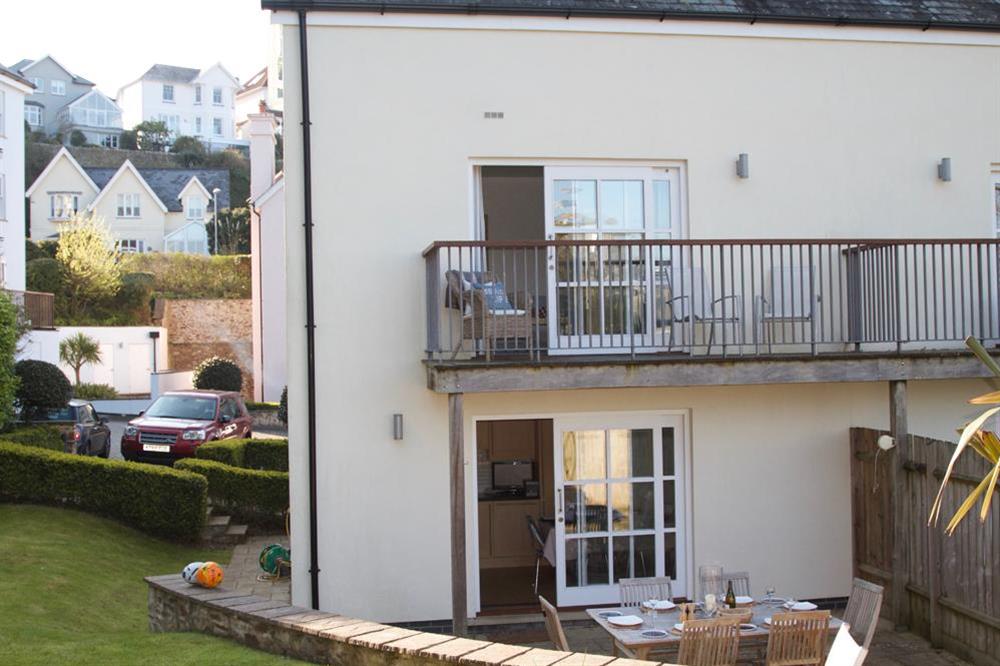 The garden area just off the kitchen with table and chairs (photo 2) at 2 Combehaven in Allenhayes Road, Salcombe