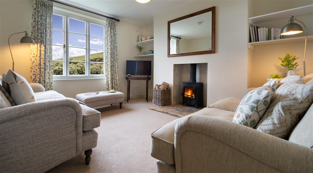 The sitting room at 2 Currendon Cottages in Swanage, Dorset