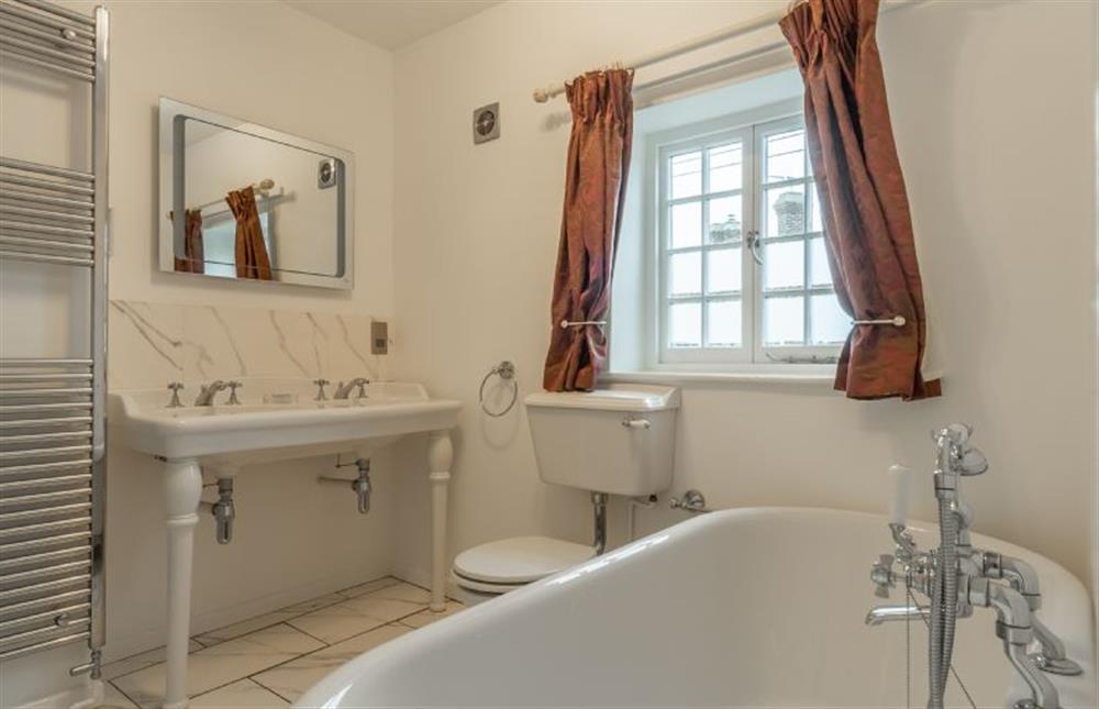 First floor: Bathroom with twin sink at 2 Dix Cottages, Thornham near Hunstanton