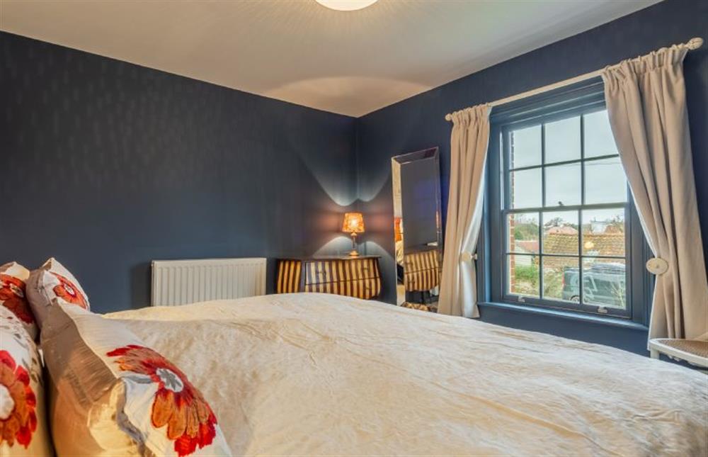 First floor: Bedroom two with super-king zip and link at 2 Dix Cottages, Thornham near Hunstanton