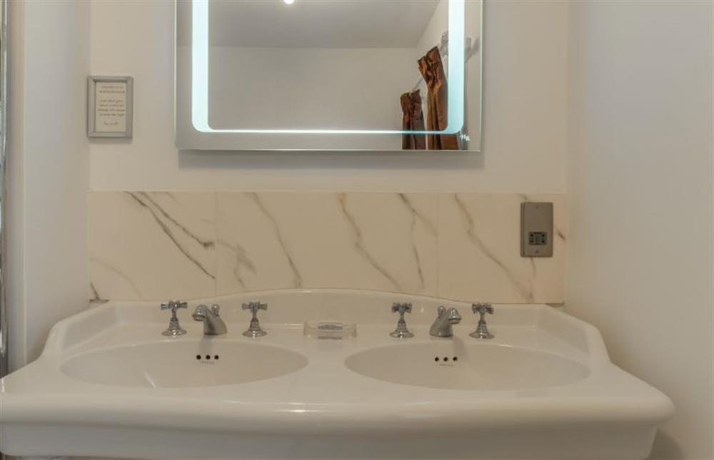 First floor: Family bathroom with twin sinks and touch operated mirror at 2 Dix Cottages, Thornham near Hunstanton