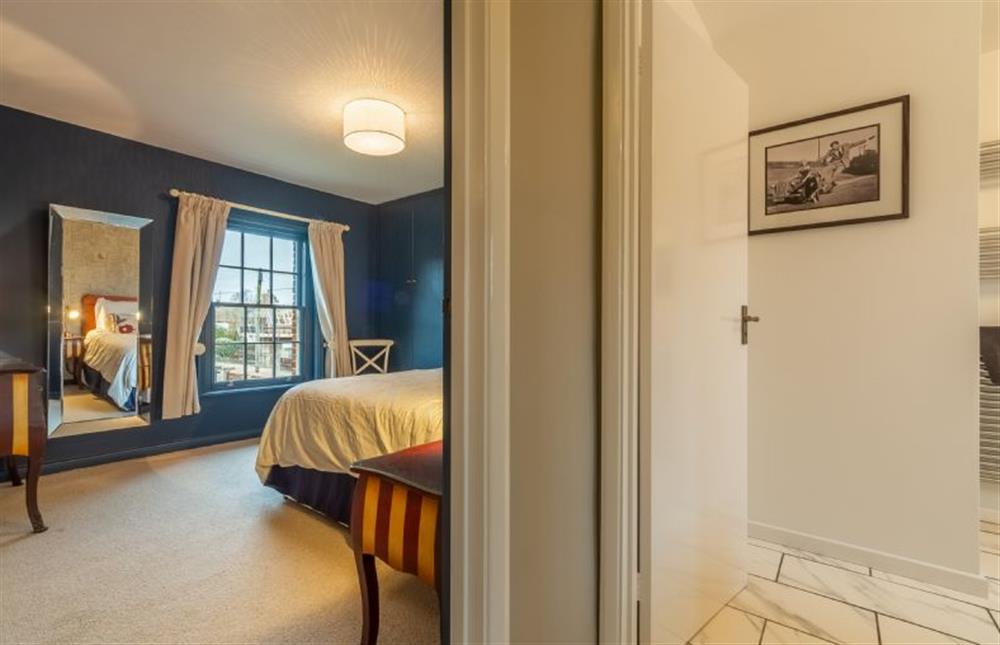 First floor: Landing to bedroom two and family bathroom at 2 Dix Cottages, Thornham near Hunstanton