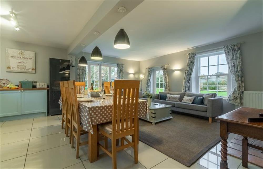 Ground floor: Open plan living area with french doors to garden at 2 Dix Cottages, Thornham near Hunstanton