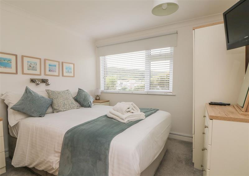 A bedroom in 2 Europa Court at 2 Europa Court, Mawgan Porth