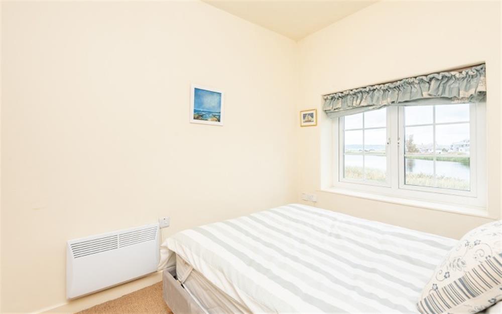 Bedroom 2 also with views over the ley at 2 Florence Cottage in Torcross